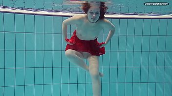 Preview 3 of Elles Movie Review - Red Dressed teen swimming with her eyes opened