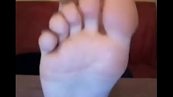 Preview 4 of Mistress Nia Full Video Femdom - webcam model in sweatshirt suck her own toes
