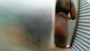Preview 4 of Sister Boobs Pressing - Chica morena en cabina al aire libre (tetona)