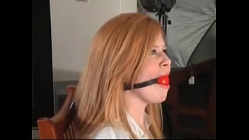 Preview 3 of Supence Sms - Cute little teen redhead tied and gagged into chair