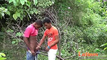 Preview 1 of College Cutie Craves Cock - Two handsome Latinos tasting meat in the forest