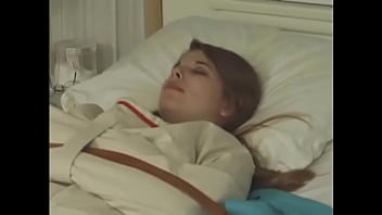 Preview 1 of Beg Xxx Mom - Pretty brunette in Straitjacket taped mouth tied to bed hospital