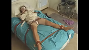 Preview 4 of Beg Xxx Mom - Pretty brunette in Straitjacket taped mouth tied to bed hospital