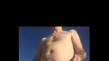 Preview 2 of Sassy Suemovies - Guy in white boxers with stiffie on beach
