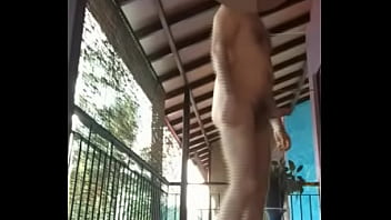 Preview 1 of Tamilmalusex - Guy with hard cock struts naked  on balcony