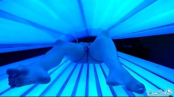 Preview 2 of Kigurimi - teen latina student gives lesbian pussy a massage in tanning bed