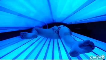 Preview 3 of Kigurimi - teen latina student gives lesbian pussy a massage in tanning bed