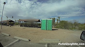 Preview 2 of Lesbian Sisiter - Porta Gloryhole Blonde milf sucking dick in the desert