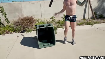 Preview 1 of Double Penetration Triple - Derek Kage and Logan Aarons work up a sweat in the parking lot playing a game of street hockey