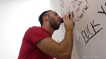 Preview 2 of Tow Girl Only Xxx - Bearded guy sucking off a black cock at a gloryhole