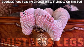 Preview 1 of Fuke Tit Boob - Goddess foot teasing in cute white fishnets on the bed