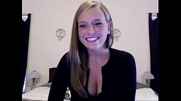 Preview 1 of Very Young Student - white american girl smiles and shows cleavage at home