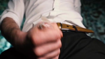 Preview 3 of Urgent Cash - Sexy guy in a suit jerks off close-up,  moans with pleasure and cums in a condom.