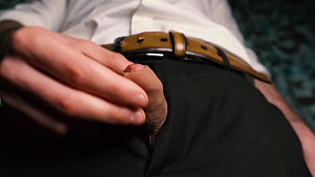 Preview 1 of Urgent Cash - Sexy guy in a suit jerks off close-up,  moans with pleasure and cums in a condom.