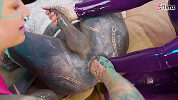 Preview 4 of Beach Peep - Can She Take Two Fists - Sissy getting fisted by two chicks in LATEX
