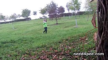 Preview 1 of Public Porn Is Risky - Blonde gets off pants and pees in a garden