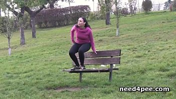 Preview 1 of Ripeherup - Hot brunette pissing on a bench in a park