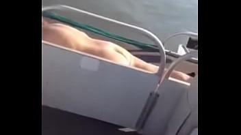 Preview 1 of Tennessee Babe - blonde MILF sun bathing Naked on pontoon boat