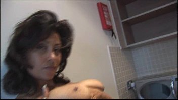 Preview 4 of Noughty American Xnxx Big Bobs - Big tits mature babe in tight mini skirt posing