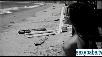Preview 1 of Obsse - Tanned superbabe rubs herself on sandy beach