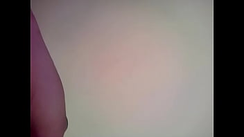 Preview 1 of Lesbian Rubs Clit With Tit - VID-20131022-00202.MP4