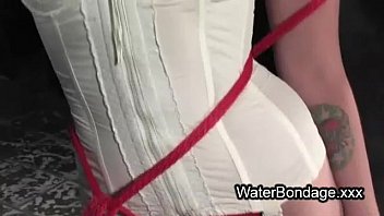 Preview 1 of Everyone Porn - Bound brunette in red rope in water sink