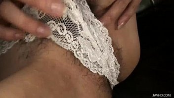 Preview 2 of Dog And Womens Video - Lovely Maki looks great in white lace and thigh high stockings as she toys her p