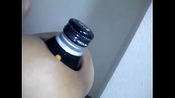 Preview 1 of Peta Jensen Lez - A bottle is put into the anus.
