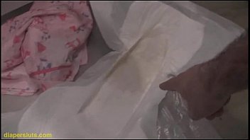 Preview 4 of Mature Fat Interracial Anal - Cute black girl pisses in her diaper