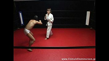 Preview 1 of Iconrazz - Masked slave suffers b. by mistress inside the ring