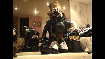 Preview 4 of Big Boobs Woman With Two Men - Roxina2010BizarreRubberDollInHelmet040610.WMV
