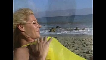 Preview 1 of Asain Pegging - Sondra Hall and Jordan Haze lesbian sex on the beach.