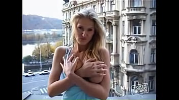 Preview 2 of Choto Meye Sex Video - Busty Jane Darling strips on a balcony daytime then masturbates