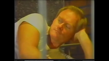 Preview 1 of Riffy Git - A long-haired brunette in a corset fucks at the same time with two athletic stallions and sucks their tight trunks
