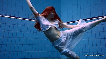 Preview 3 of Proneass - Redhead Marketa in a white dress in the pool