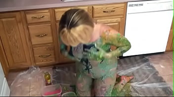 Preview 3 of Kir30sant - Blonde in kitchen rubs green paint over her tits and ass
