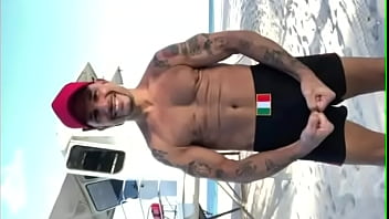 Preview 2 of Lipping Of Mouth In Female - THE PORN STAR CHAMPION MODELING SWIM TRUNKS AT THE BEACH