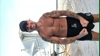 Preview 1 of Lipping Of Mouth In Female - THE PORN STAR CHAMPION MODELING SWIM TRUNKS AT THE BEACH