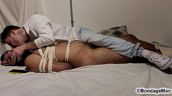Preview 4 of Tripping Drugs - Tonny finds Duratto roommate bound and gagged and instead of letting him free he decides to kiss and then put a sock inside Duratto&#039_s mouth,  suck and rub his feet on Duratto&#039_s face | PREVIEW