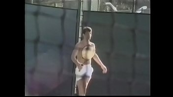 Preview 1 of Britni And Max Factor - Tennis player likes to loosen his penis stiff muscles after excercises with ball shooter machine and drop his load on his tennis racket