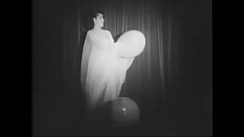 Preview 3 of Nimpe Chosty Huy - Erotic retro model with a beautiful figure plays with balloons for the crowd on stage