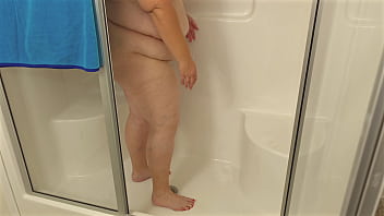 Preview 1 of Flash My Coworker - Big Boobed bbw  busty milf white girl maid with hot juicy fat ass in mini dress panties to the side cleaning house showering and flashing pussy close up with upskirt view