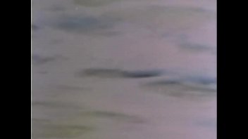 Preview 3 of Young T Hot - John Holmes fucks Lesllie Bovee on a Beach