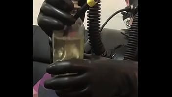 Preview 3 of Fish In Poushi - Rubber Slave with Piss Inhaler