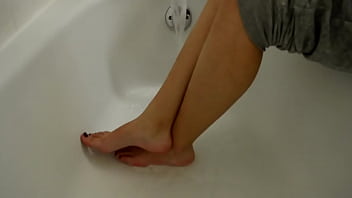 Preview 1 of Indian Tit Fight - TSM - Dylan plays in the water using her sexy asian feet