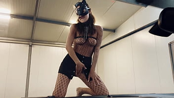 Preview 3 of Arabic Kompoz - A Teen Girl Public Outdoor in a BDSM fetish mask dances naked on a car at a car wash