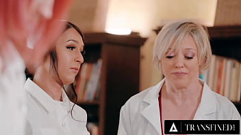 Preview 2 of Oil Bhooty - TRANSFIXED - Natural Trans Nurse Jean Hollywood Proves Herself With FULL BODY EXAM And FOURSOME!