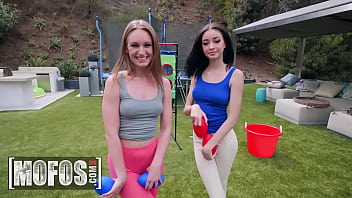 Preview 1 of Dog And Aunty Ki Chudai - (Daisy Stone,  Scarlett Bloom) peel the painted-on leggings of two young cock-fiends and covering their cute faces with a thick load - Mofos