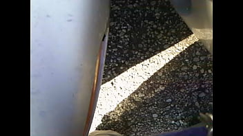 Preview 2 of Webcam Nerd Door - Pissing between two cars