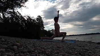 Preview 3 of Masagge Dh - Slender nudist boy does yoga nude on a naturist beach. Naked yoga video by Jon Arteen gay porn model